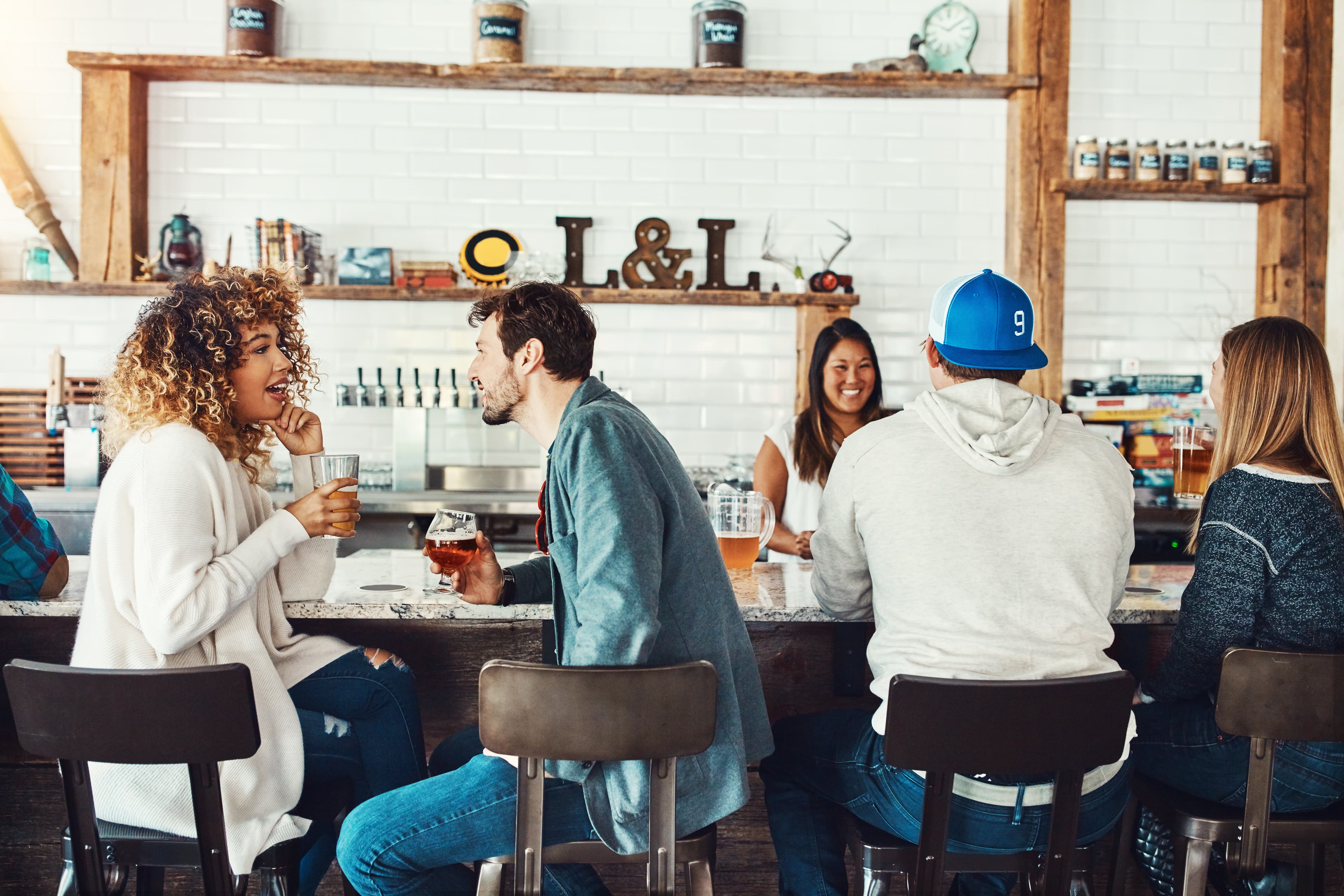 Group of friends socializing and laughing at a gathering